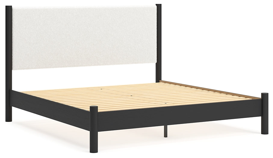 Cadmori King Upholstered Panel Bed with Dresser