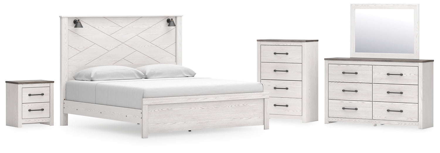 Gerridan King Panel Bed with Mirrored Dresser, Chest and Nightstand